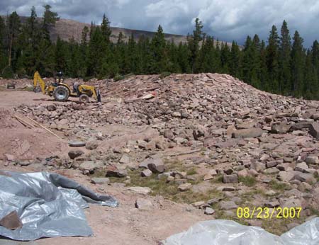 22-Clements Lake Stabilization, dam site during construction, breach and inlet lining progress