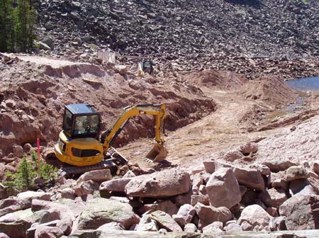 07-Deer Lake stabilization, crew exacavates down to outlet pipe