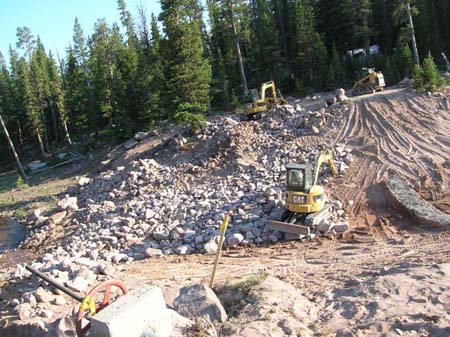 08-Island Lake Stabilization, riprap placement using mini-excavators and front loaders