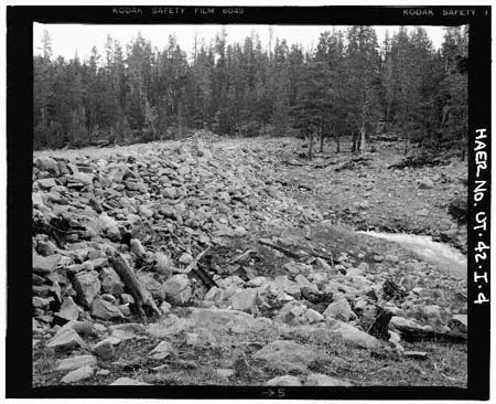 HAER photo of downstream face and toe of Island Lake Dam, July 1985