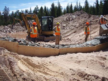 07-Kidney Lake Stabilization, installing gabion baskets at upstream cut-off wall