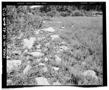 HAER photo of upstream face of White Miller Lake Dam, looking west, July 1985